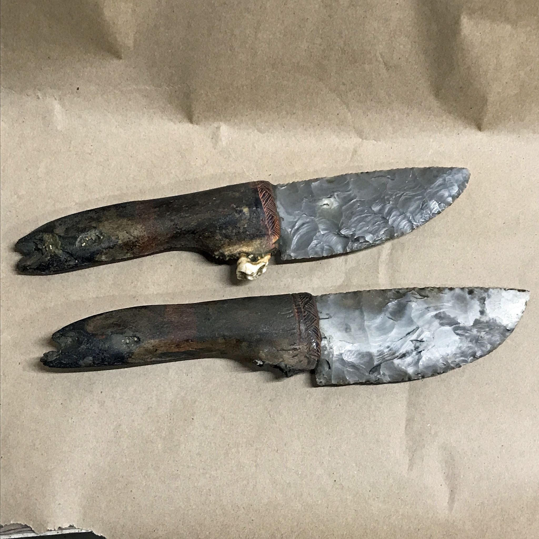 2 buffalo jawbone knives with flint blades