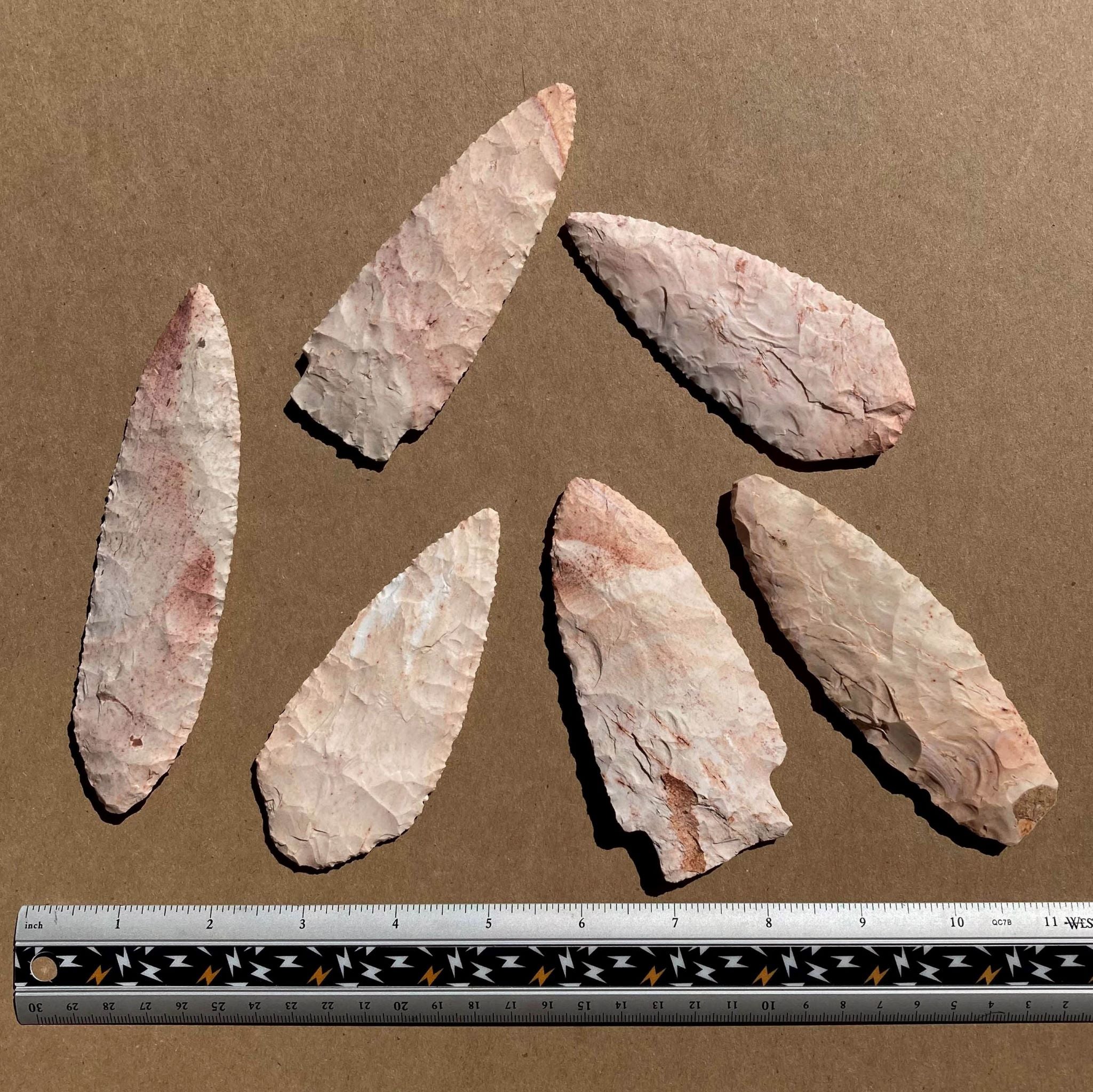 reverse side of group of keokuk straight knife blade, spear points, lance blades