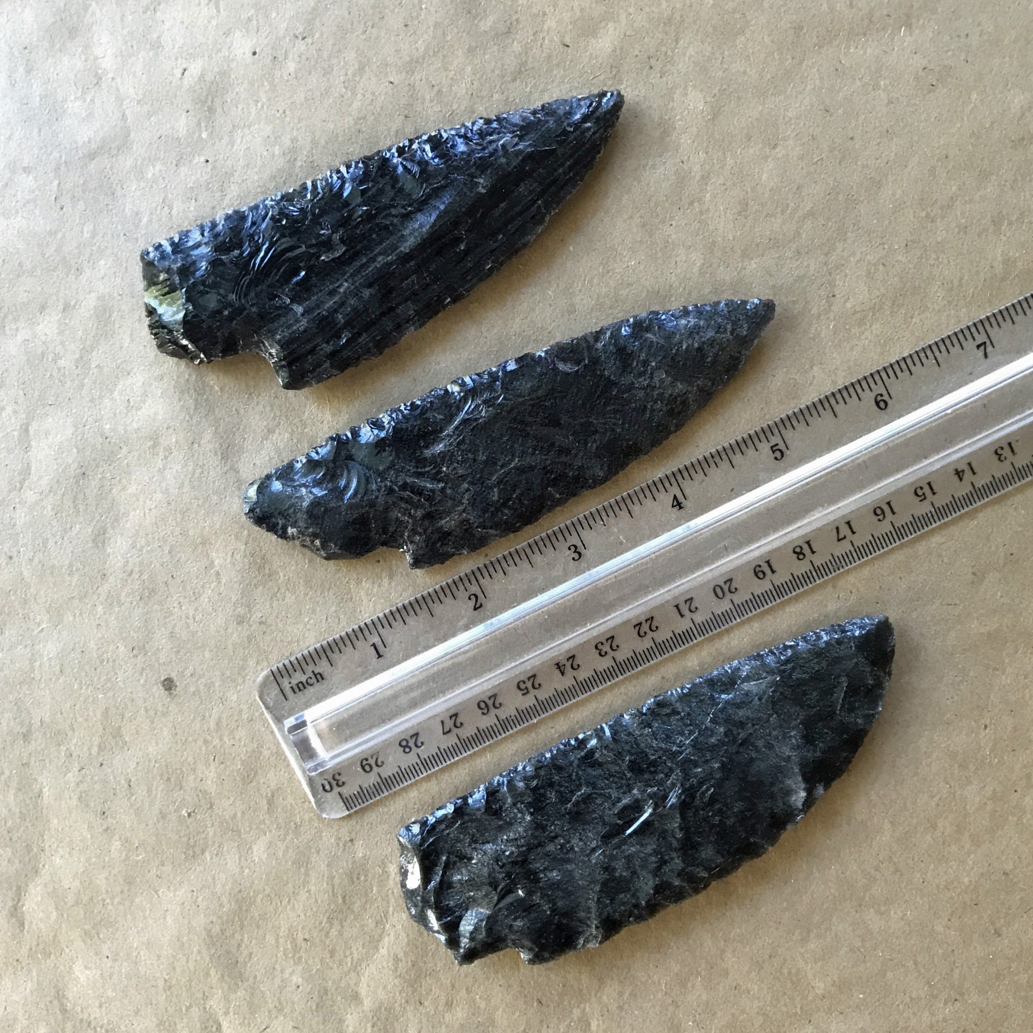3 black sheen obsidian blades with ruler