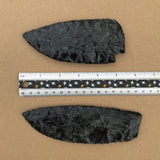 2 black sheen obsidian blades with ruler for scale, reverse side