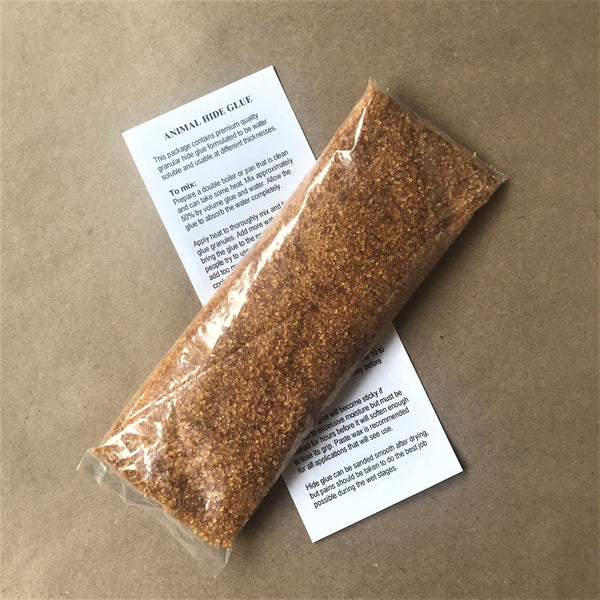 Five ounce bag of granular animal hide glue with instructions