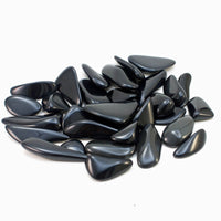 group of high-gloss black obsidian tumbled stones