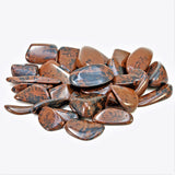 Group of tumbled Mahogany Obsidian stones with high-polish 