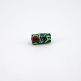 Side view bead with red & green swirls on black core