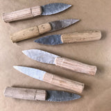 6 examples of Paleo style knife blades with wooden handles