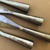 4 #2 grade socketed steel lance heads, close-up