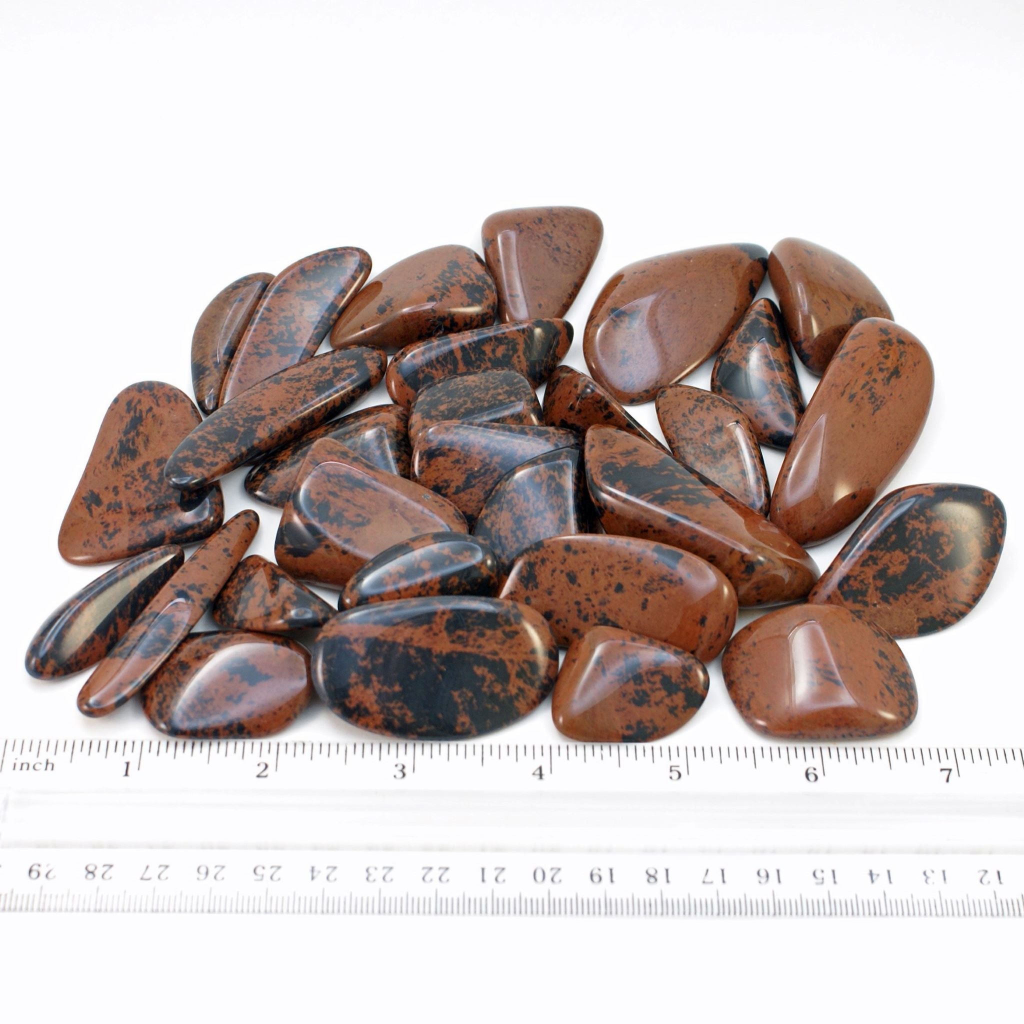 Mahogany Obsidian tumbled stones with ruler